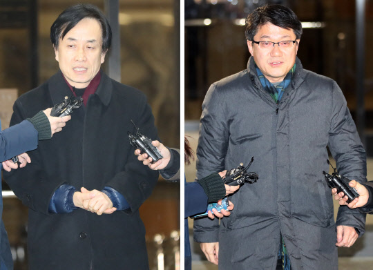 13일 새벽 이명박 정부 시절 국가정보원 특수활동비 수수 혐의인 김희중 전 대통령 제1부속실장(왼쪽)과 김진모 전 민정2비서관이 서울중앙지검을 나서고 있다.